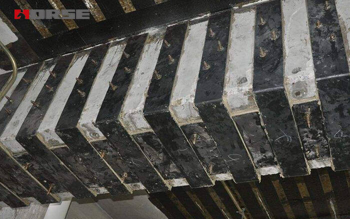 Yapıştırıcı ile birleştirilmiş çelik levha ile kiriş ve kolonun güçlendirilmesi Yapıştırıcı ile birleştirilmiş çelik levha ile kiriş ve kolonun güçlendirilmesi