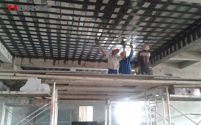 Döşemenin eğilme takviyesinde kullanılan karbon fiber kumaş Döşemenin eğilme takviyesinde kullanılan karbon fiber kumaş