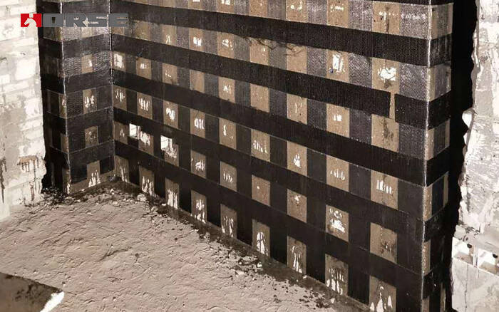 Karbon fiber kumaşla kesme duvar güçlendirmesi Karbon fiber kumaşla kesme duvar güçlendirmesi