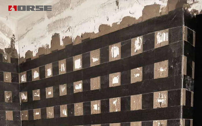 Karbon fiber kumaşla kesme duvar güçlendirmesi Karbon fiber kumaşla kesme duvar güçlendirmesi